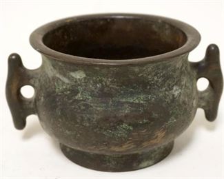 1155	ASIAN BRONZE DOUBLE HANDLED POT W/CHARACTER MARKS ON BASE, POT HAS CRACK, APPROXIMATELY 3 1/2 IN HIGH
