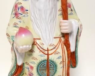 1200	LARGE ASIAN POTTERY STATUE OF MAN HOLDING A CANE, TOP OF CANE REMOVABLE, APPROXIMATELY 24 IN HIGH
