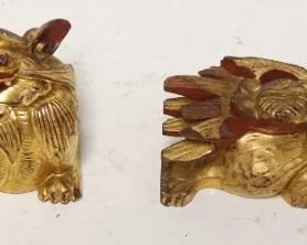 1217	2 CARVED WOOD GILT FOO DOGS, LARGEST APPROXIMATELY 8 IN LONG
