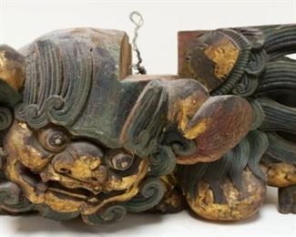 1218	LARGE CARVED WOOD POLYCHROME FOO DOG, APPROXIMATELY 13 IN X 17 IN X 9 IN HIGH
