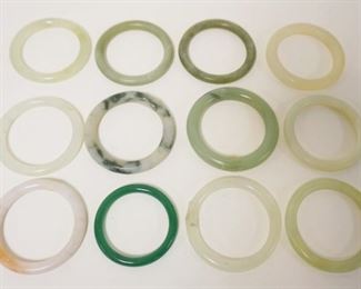 1248	12 PIECE JADE BRACELET LOT, LARGEST APPROXIMATELY 3 1/4 IN
