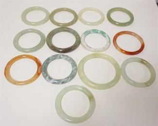 1249	13 PIECE JADE BRACELET LOT, LARGEST APPROXIMATELY 4 IN
