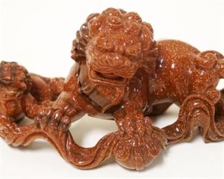 1251	BROWN STONE W/GOLD FLECK CARVED FOO DOGS, APPROXIMATELY 6 IN X 3 IN HIGH
