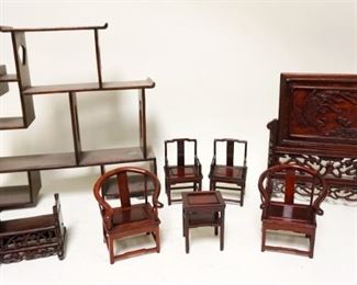 1273	ASSORTED MINIATURE ASIAN WOOD ITEMS, SCREEN, SHELF, & FURNITURE, SCREEN HAS SOME CARVING LOSS, LARGEST PIECE APPROXIMATELY 15 IN HIGH

