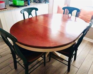 Farmhouse pedestal dining table with four chairs, leaf included in table