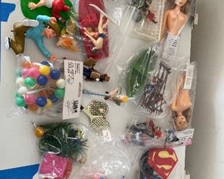 Lots of cake toppers, many different genres