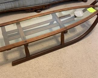 beautiful antique sleigh made into a table