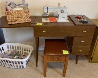 Elna sewing machine in cabinet