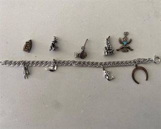 Sterling charm bracelet and charms