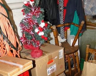 Coats, extension cords, and holiday items too, along wtih some solid wood chairs