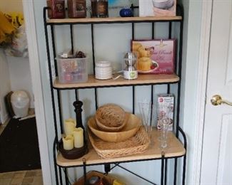 Candles, large display plate, fountain, and wicker baskets