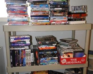 Quite possibly the worlds largest collection of DVD's and CD's. Again, do not be shy, the shelf is also for sale