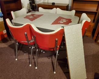 Early MCM Table with 6 Chairs and Leaf in great condition