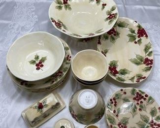 Holiday 07 Classic Tidings Christmas Dinnerware: 
4 dinner plates, 4 dessert plates, 4 soup/cereal bowls, 10” round serving bowl, pedestal serving bowl, serving platter, butter dish, and cream and sugar bowl set. 18 pieces and 2 lids/tops. 
