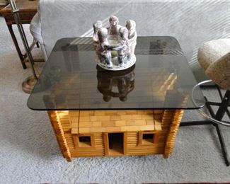 Log Cabin coffee table houses a very fun secret