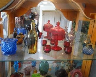 Red, blue and clear, along with amber glass pieces