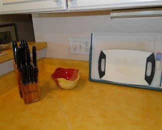 Knife set, hand made bowl, and cutting boards too