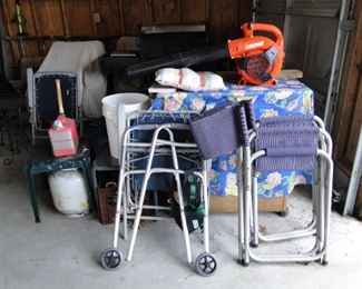 Assorted walkers and canes, and folding chairs too