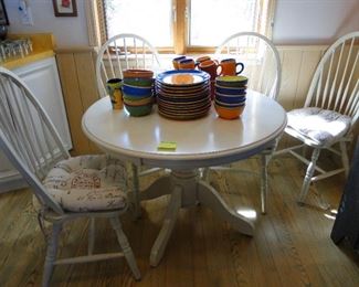 Round table with 4 chairs, and fun dinnerware set too