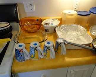 Salad bowl with tongs, brownie pan, and other bakeware