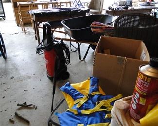 Table and chairs and other fun collectibles in the garage