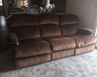 Watching TV and movies is even better on this comfy couch with a recliner on each end. 