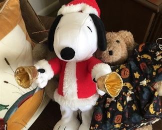 Hallmark’s version of Snoopy rings bells. His furry bear friend has a Christmas print dress to change into. 
