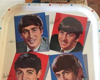 Collectors of Beatles memorabilia are sure to swoon over this Fab Four square tray.