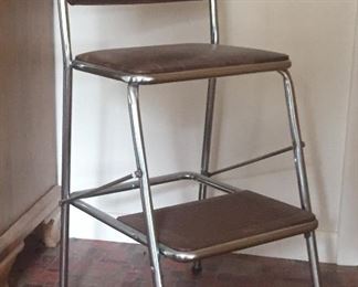 A vintage Cosco stool/chair is ready to give a boost or a seat. 