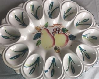 Deviled eggs are served in style on this decorative egg plate. Easter eggs would also be neat on this plate. 