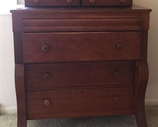 Empire dresser featuring two smaller drawers at top.