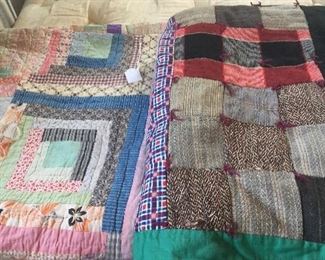 A log cabin quilt, left, features a variety of cotton fabrics while woolens mingle on the other quilt. 