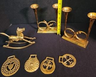 Brass decor items, rocking horses, candalabra 