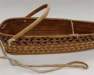 A THOMPSON RIVER DOLL SIZE PAPOOSE CARRIER