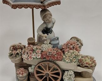 A LLADRO PORCELAIN FLOWER CART. FLOWERS OF THE SEASONS