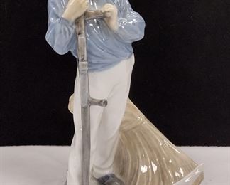 A ROYAL COPENHAGEN HARVEST FARMER FIGURINE