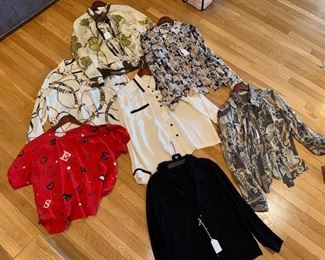 Lots of ARMANI...Giorgio Armani black label. Escada, St. John (to name a few) Women's clothing ranges from US medium or size 6 to US size 8. There are some small and larges too