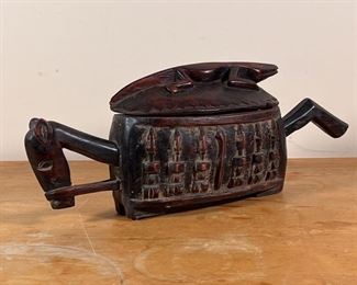 ETHNOGRAPHIC CARVED VESSEL | Carved wood horse-form vessel with a lizard on the back
Dimensions: h. 7-1/4 x w. 18 in.