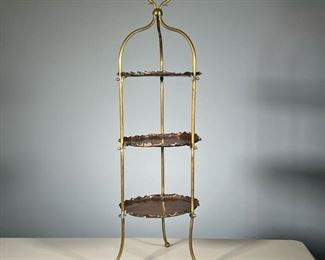 COPPER STAND | Three tiered copper stand with scalloped edges and a heart form carrying handle, on three splayed legs
Dimensions: h. 36.5 x dia. 11 in