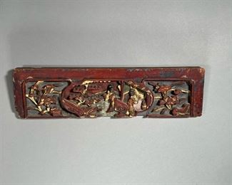 CHINESE CARVED PANEL | Carved in high relief showing figure in a court-yard scene, with gilt highlights
Dimensions: l. 17 x h. 5 in