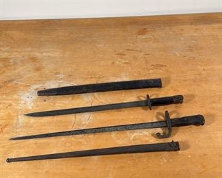 (2PC) ANTIQUE BAYONETS | Including a French bayonet "...St Etienne Juin 1876" (l. 26 in.) and one stamped "8160" and marked with a crown (l. 22-1/2 in.)