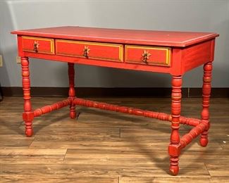 RED PAINTED WRITING DESK | By Stanley Furniture, desk / writing table having three drawers over turned legs. Dimensions: l. 49 x w. 23 in