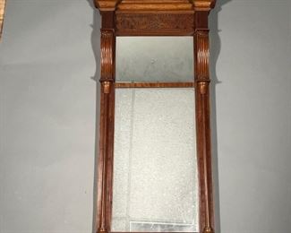 ANTIQUE AMERICAN WALL MIRROR | Carved wreath top with half spindle on the sides.
Dimensions: w. 18 x h. 42 in