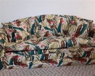 Tropical Couch.  this couch sits on a platform to make it higher but is easy to remove so it will sit lower. Very clean and very pretty