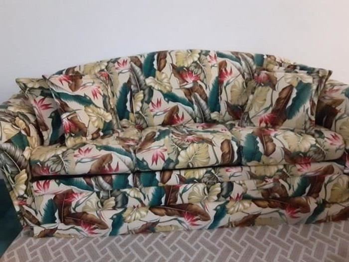 Tropical Couch.  this couch sits on a platform to make it higher but is easy to remove so it will sit lower. Very clean and very pretty