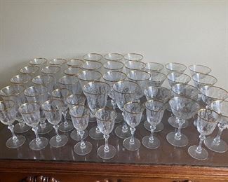 Vintage Tiffin “June Night” stemware. Etched with gold rims. 
11 iced teas, 11 waters, 11 champagnes, 10 sherries 
