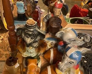 Jim Beam and other decanters-donkey and elephant footballs, hooded falcon, Paul Bunyun ...