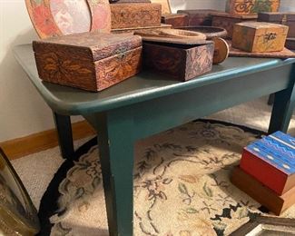 small green table with bear painted on top