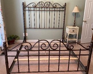 (F9) $225. Queen Iron Bed Frame. Headboard is 63" at the tallest point. Footboard is 34" at the tallest point. 