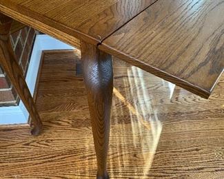 (F26) $125. Small solid wood drop leaf table. 